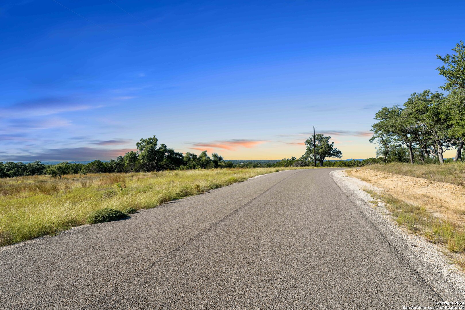 618 Windmill Ridge Drive Blanco, TX 78606 - Photo 6 of 14 a view of a yard and ocean view