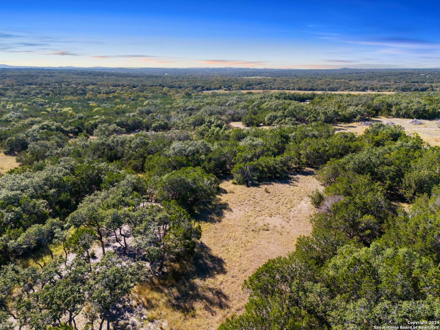 618 Windmill Ridge Drive Blanco, TX 78606 - Photo 9 of 14 a view of a city with a mountain