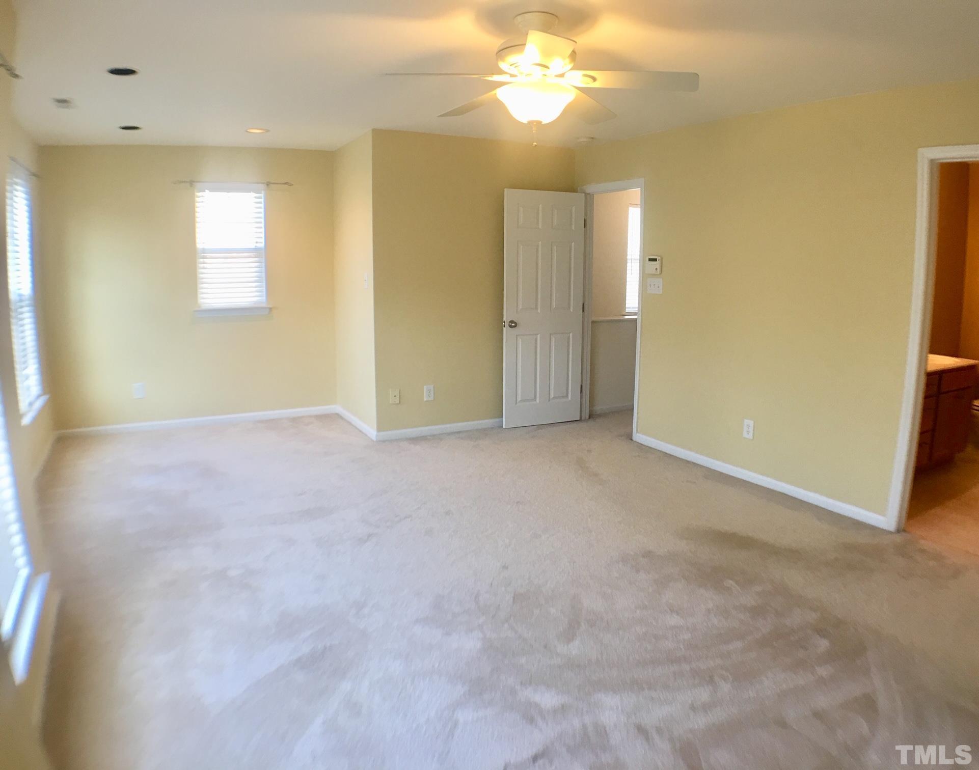 9801 Raleigh, NC 27617 - Photo 15 of 23 a view of an empty room with a window