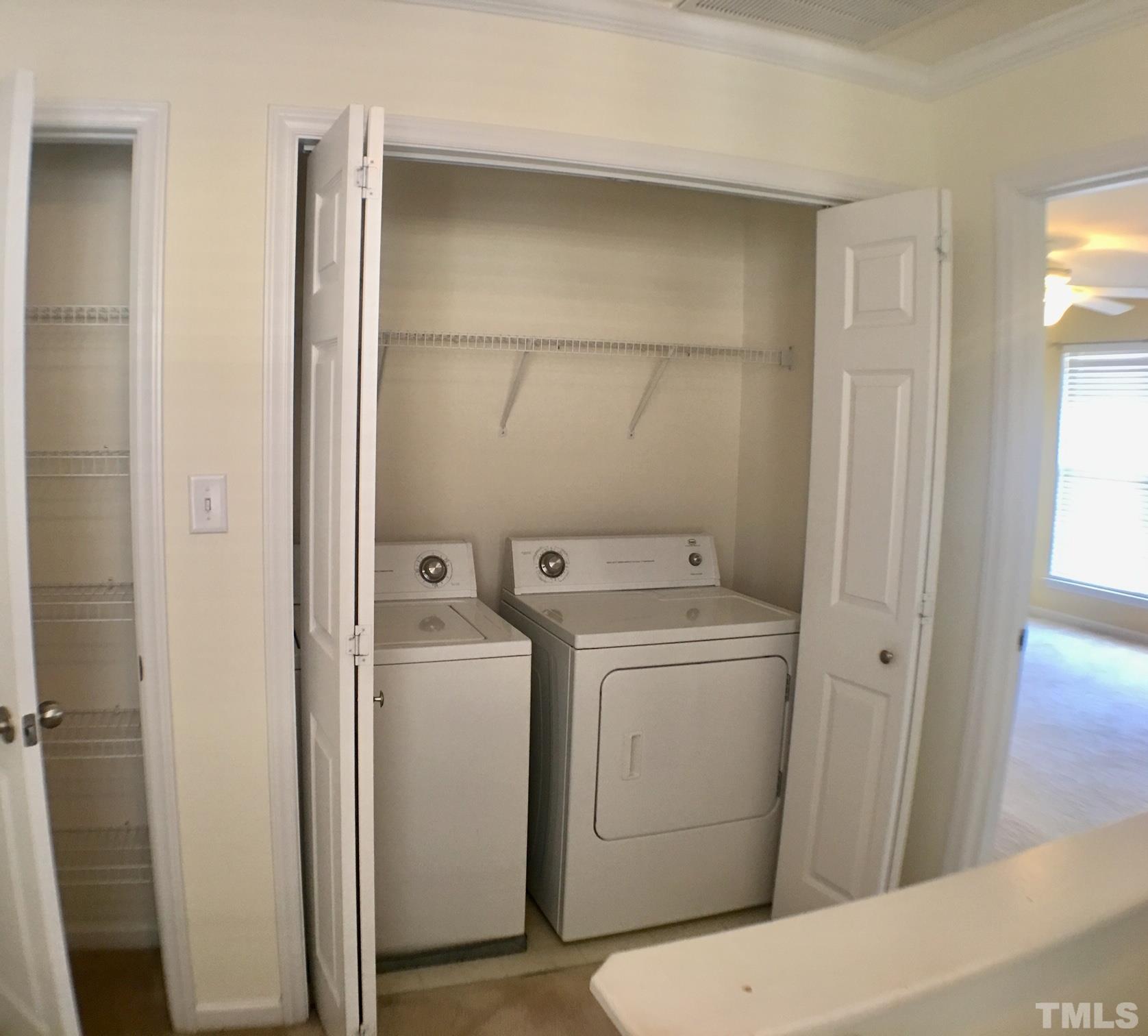 9801 Raleigh, NC 27617 - Photo 17 of 23 a bathroom with a sink and toilet