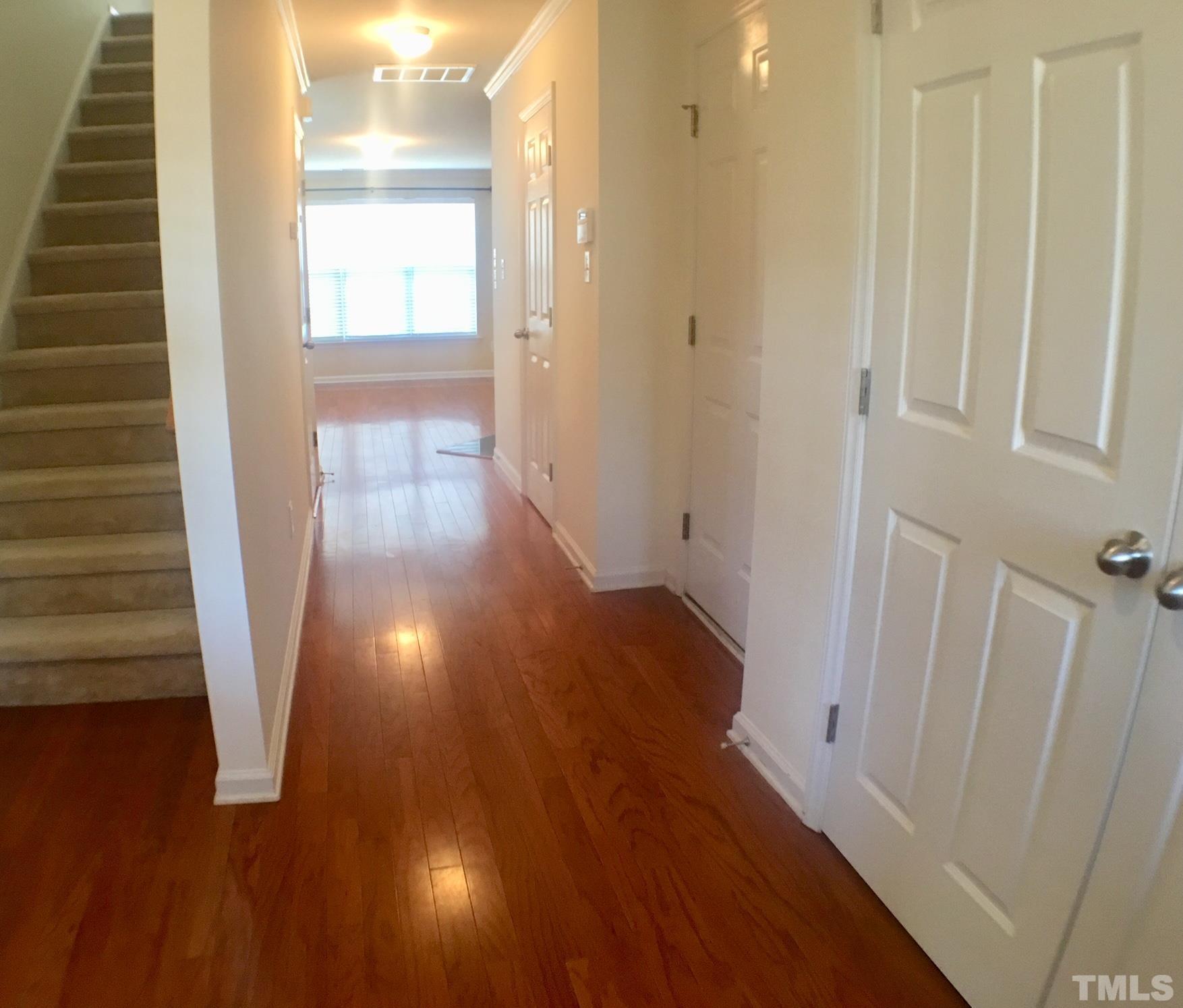 9801 Raleigh, NC 27617 - Photo 2 of 23 a view of entryway with wooden floor
