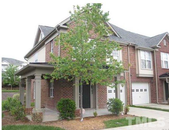 9801 Raleigh, NC 27617 - Photo 23 of 23 a front view of a house with garden