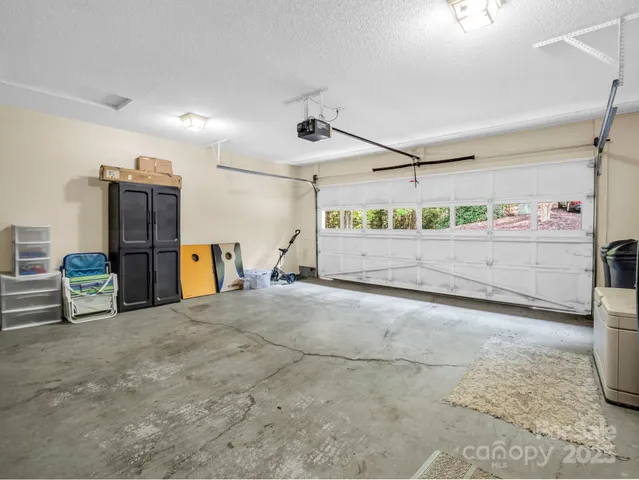 a view of a balcony with chair and table