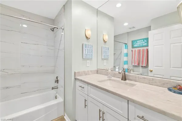 $995,000 | 9101 Vanderbilt Drive, Unit 302, Naples, FL 34108