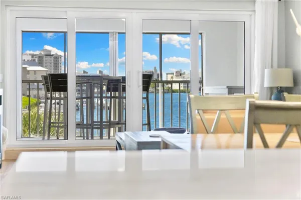 $995,000 | 9101 Vanderbilt Drive, Unit 302, Naples, FL 34108