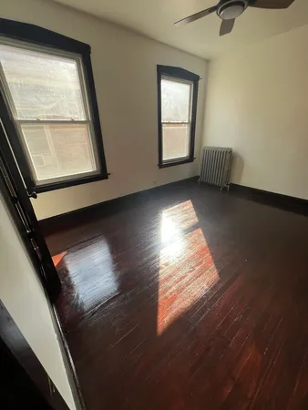 a view of an empty room and window