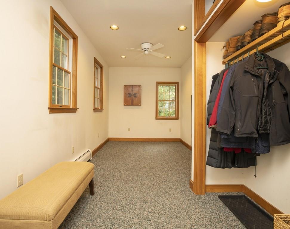 67 Chipaway Road Freetown, MA 02717 - Photo 15 of 32 a view of walk in closet with clothes and shoes