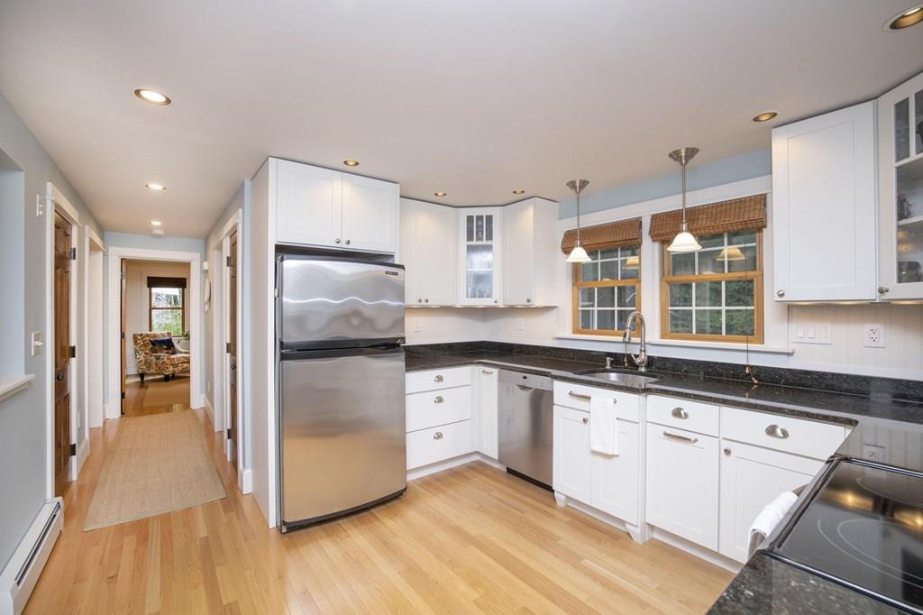 67 Chipaway Road Freetown, MA 02717 - Photo 18 of 32 a kitchen with granite countertop stainless steel appliances a refrigerator and cabinets