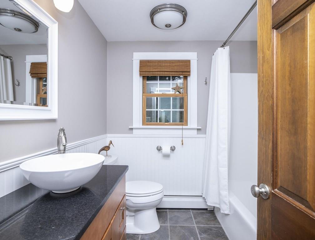 67 Chipaway Road Freetown, MA 02717 - Photo 19 of 32 a bathroom with a sink and a mirror