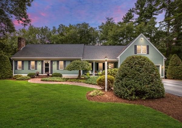 67 Chipaway Road Freetown, MA 02717 - Photo 30 of 32 a front view of a house with a yard table and chairs