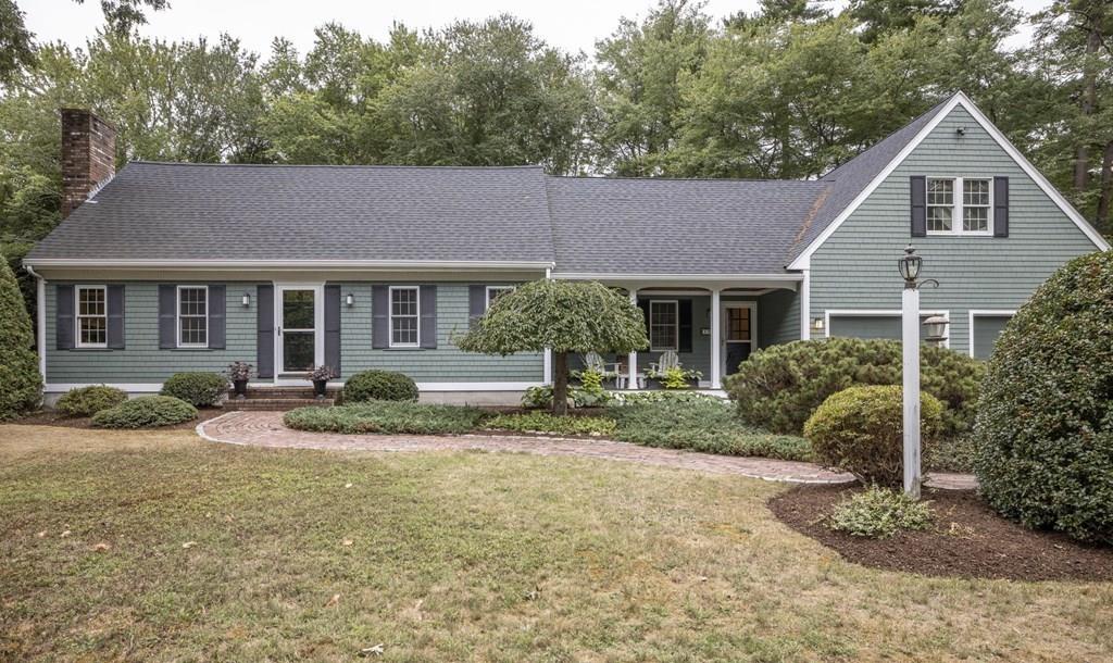 67 Chipaway Road Freetown, MA 02717 - Photo 4 of 32 a front view of a house with garden and porch