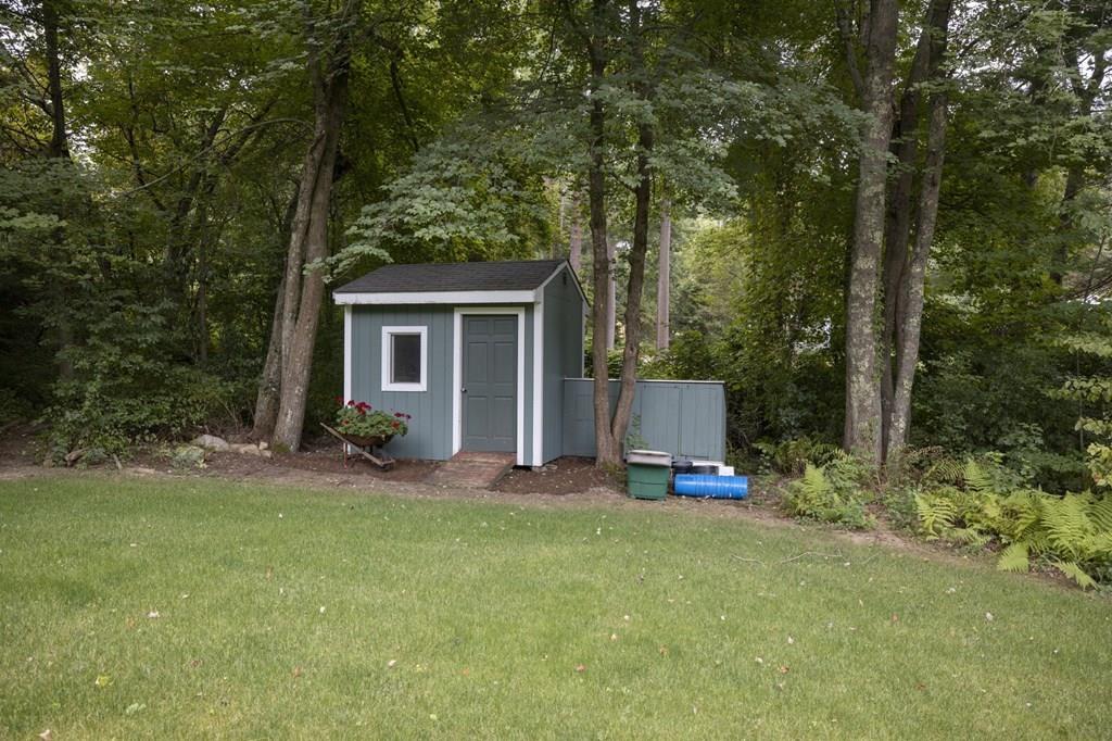 67 Chipaway Road Freetown, MA 02717 - Photo 7 of 32 a view of a house with backyard and garden