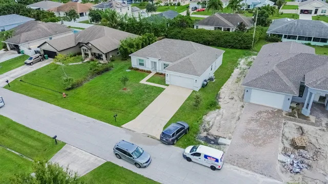 an aerial view of a house with garden