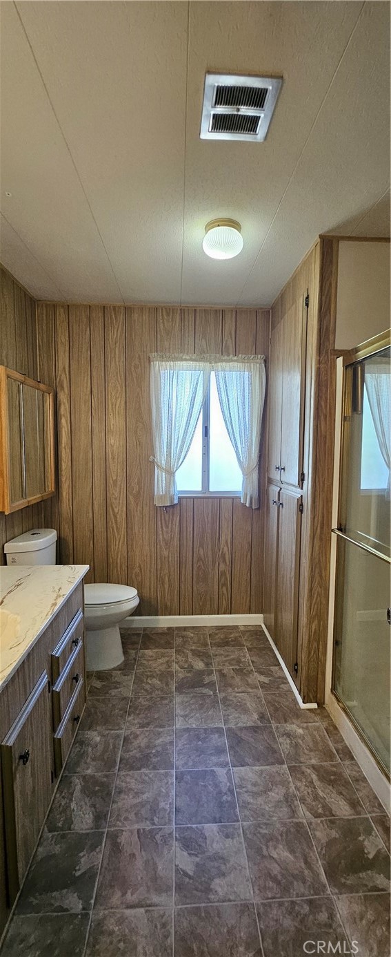 3500 Buchanan Street, Unit 128 Riverside, CA 92503 - Photo 13 of 19 a bathroom with a sink a toilet and shower