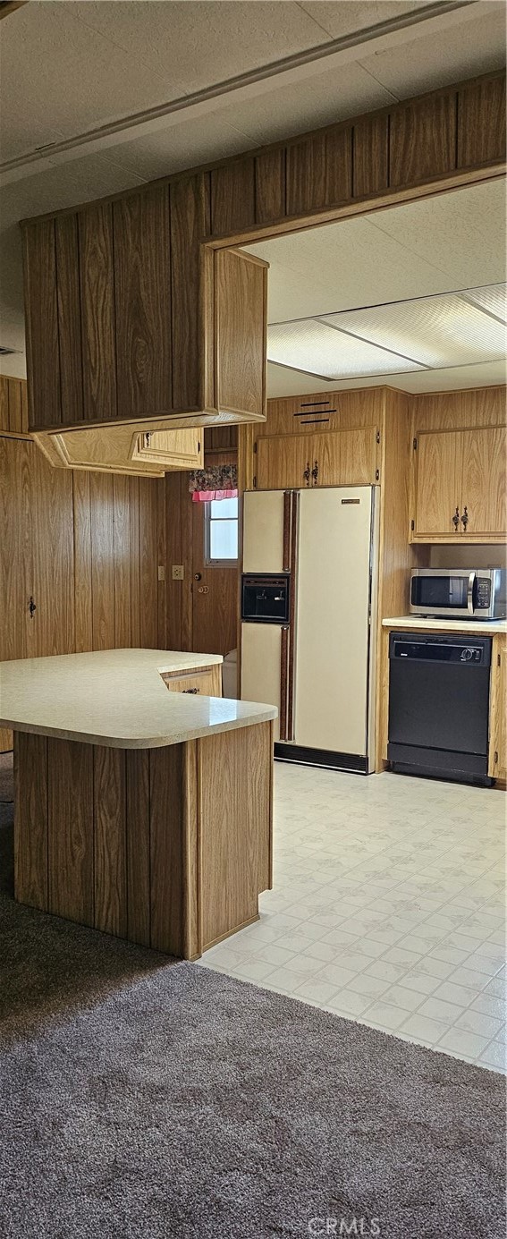 3500 Buchanan Street, Unit 128 Riverside, CA 92503 - Photo 18 of 19 a kitchen with stainless steel appliances a stove and a refrigerator