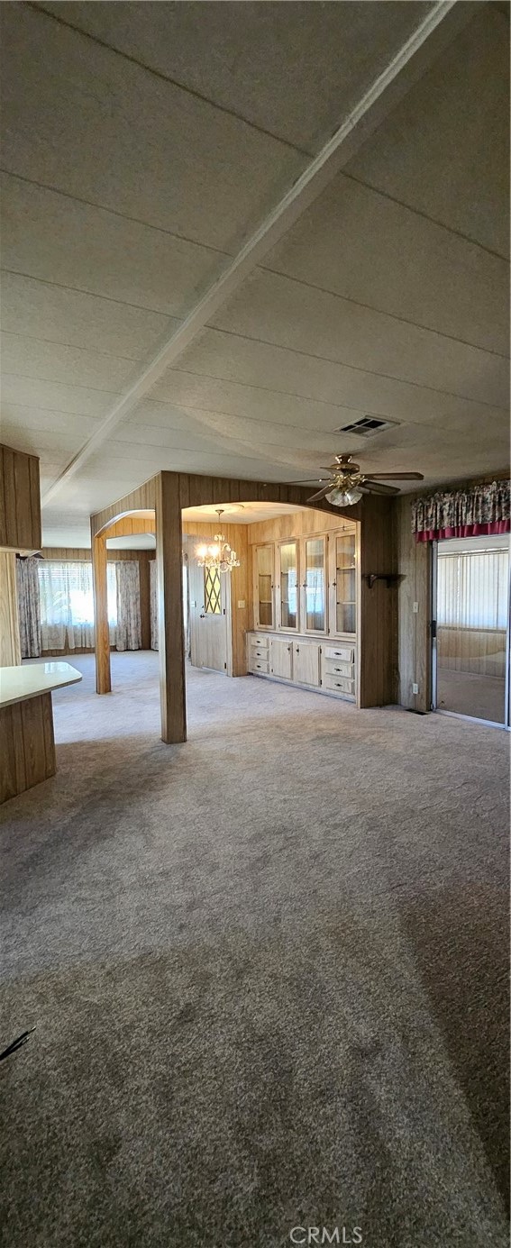 3500 Buchanan Street, Unit 128 Riverside, CA 92503 - Photo 9 of 19 a view of a big room with wooden floor and windows
