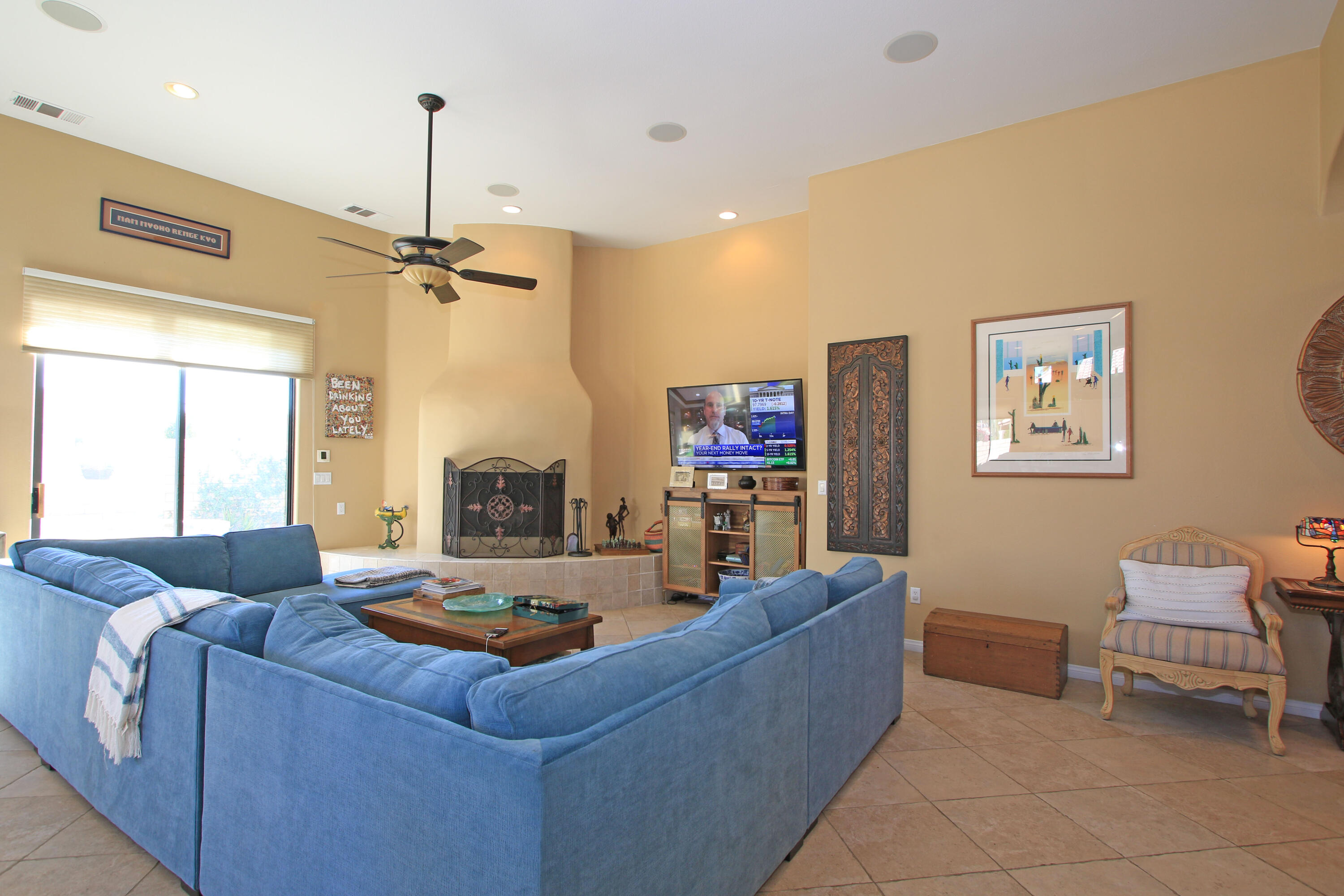 57576 Santa Rosa Trail La Quinta, CA 92253 - Photo 12 of 54 a living room with furniture and a fireplace