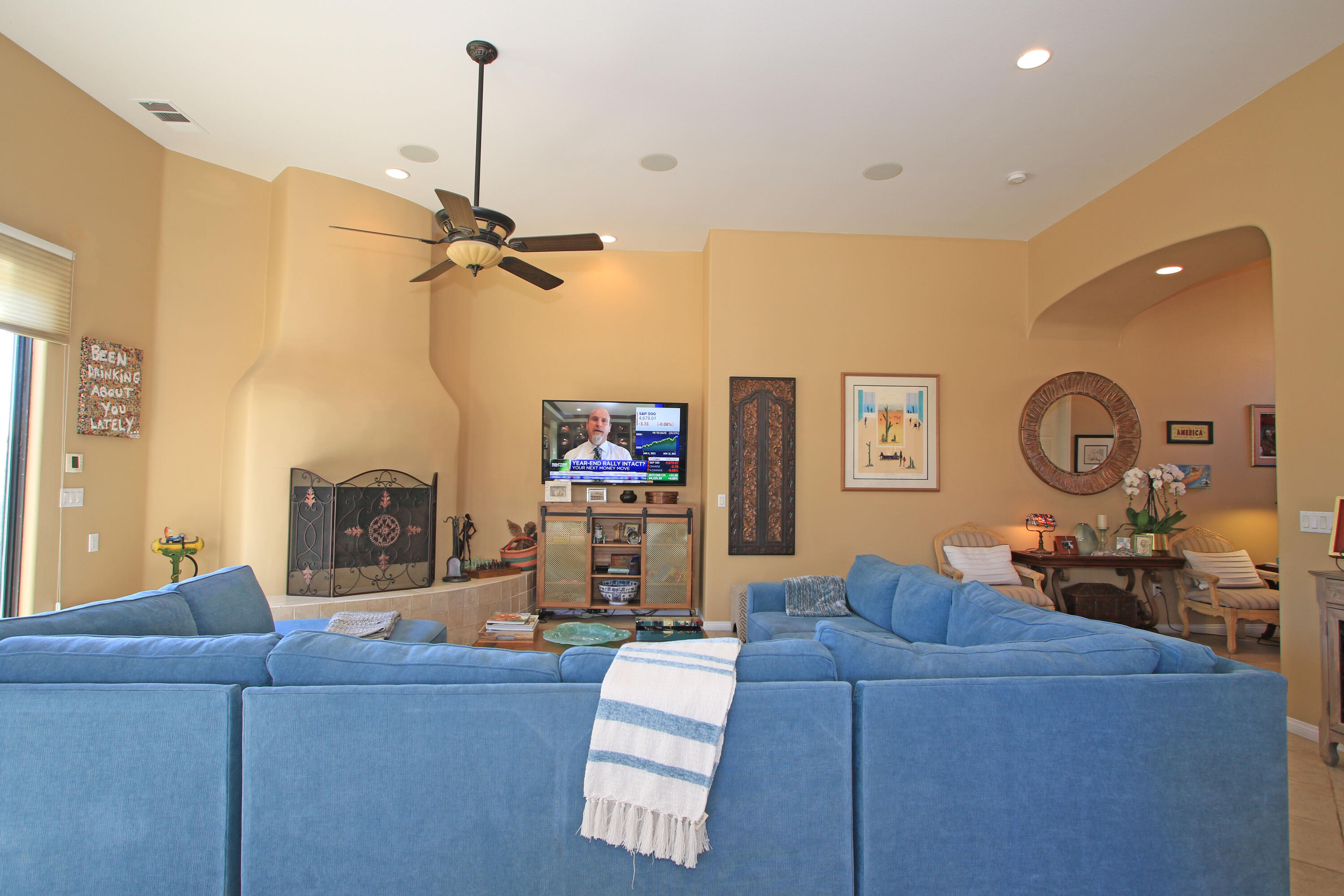 57576 Santa Rosa Trail La Quinta, CA 92253 - Photo 13 of 54 a living room with furniture a fireplace and a window