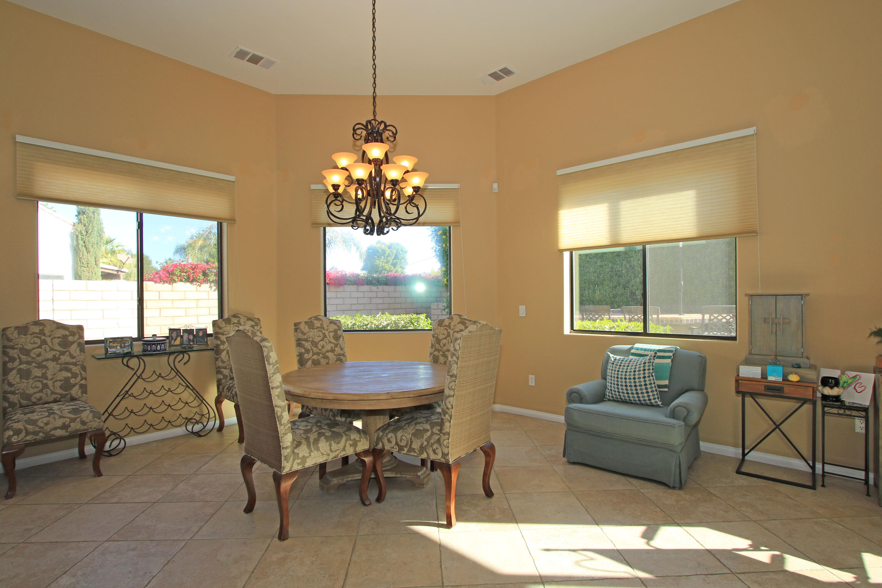 57576 Santa Rosa Trail La Quinta, CA 92253 - Photo 20 of 54 a living room with furniture and a chandelier