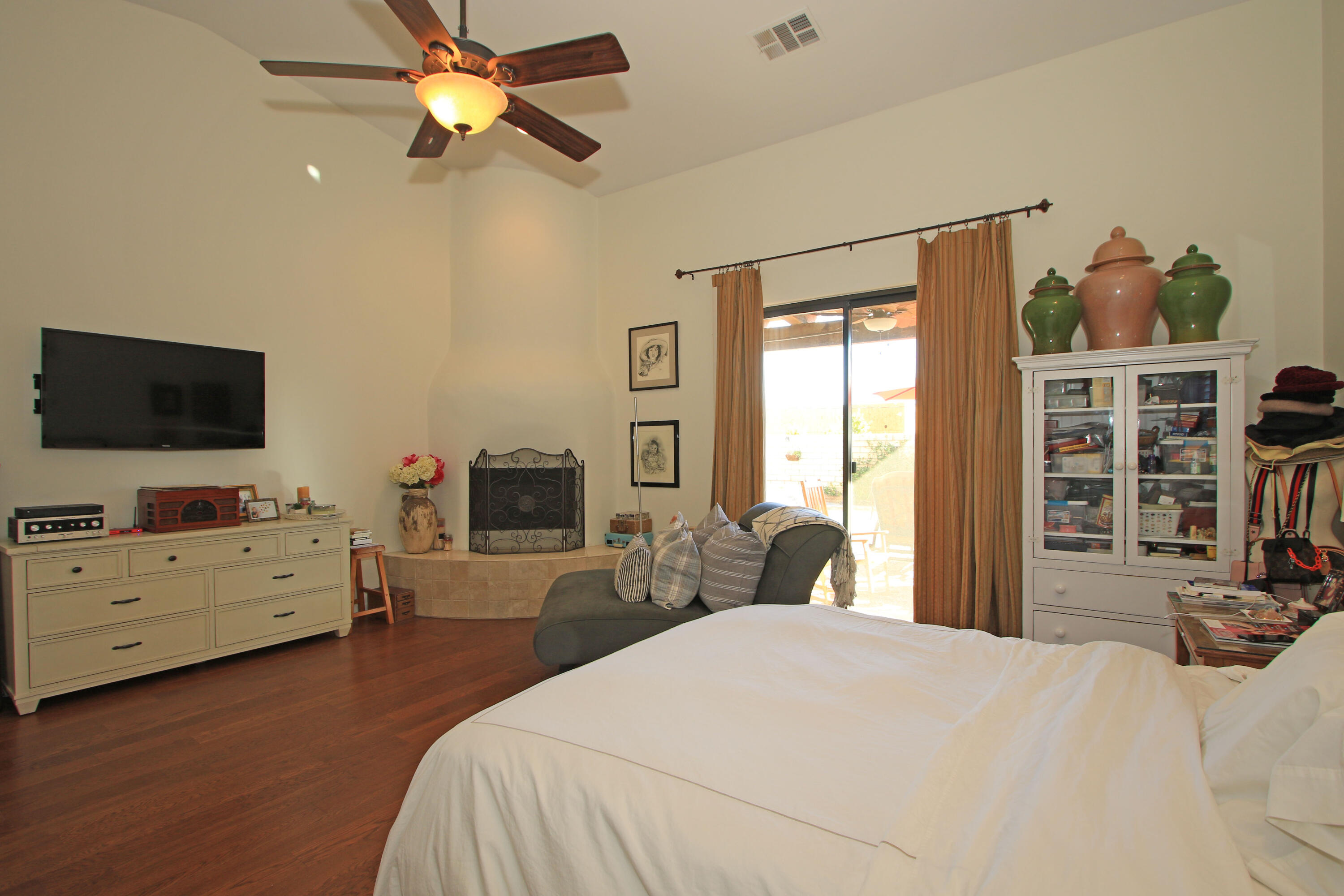 57576 Santa Rosa Trail La Quinta, CA 92253 - Photo 26 of 54 a bedroom with a bed and a flat tv screen on dresser