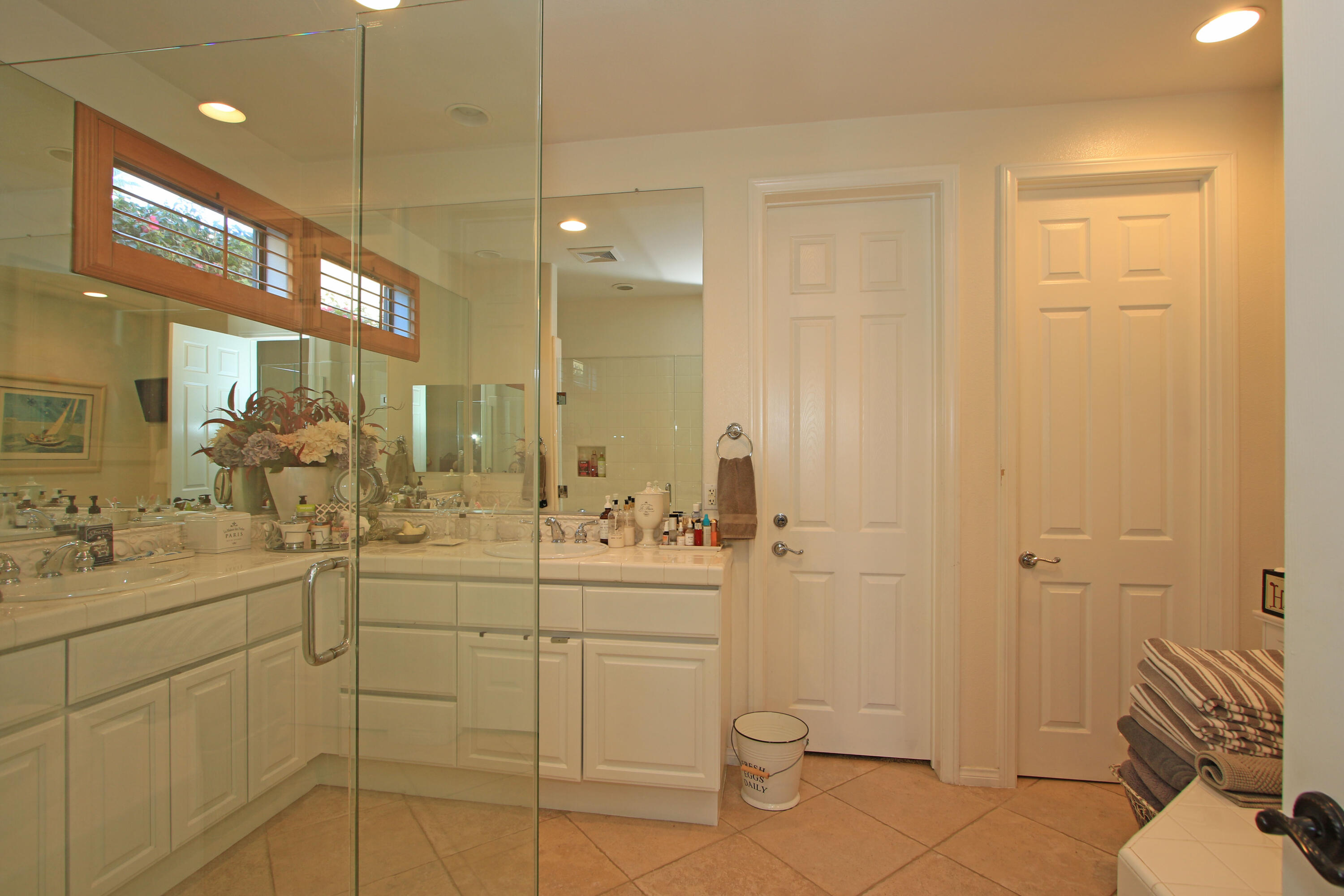 57576 Santa Rosa Trail La Quinta, CA 92253 - Photo 27 of 54 a bathroom with a sink a toilet and shower