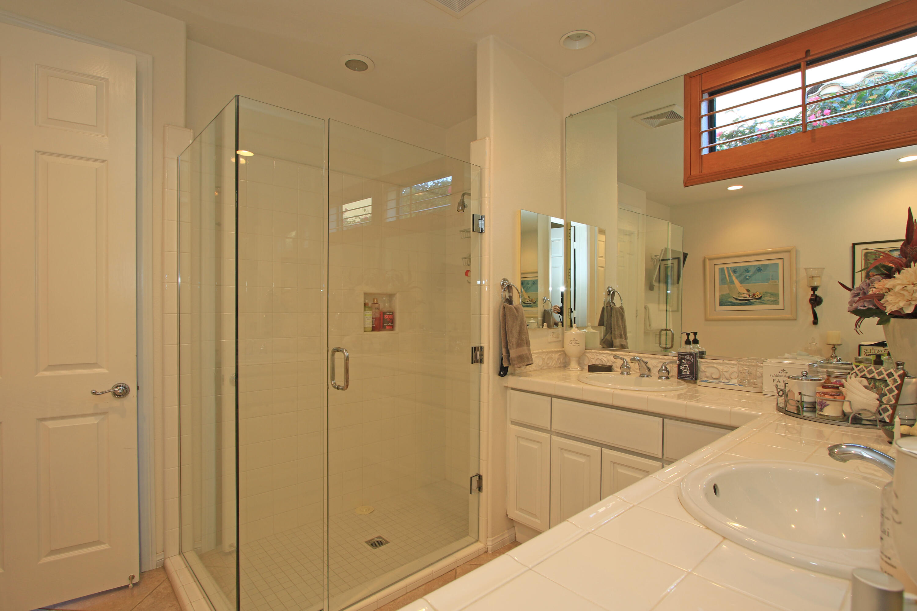 57576 Santa Rosa Trail La Quinta, CA 92253 - Photo 29 of 54 a bathroom with a tub sink and mirror