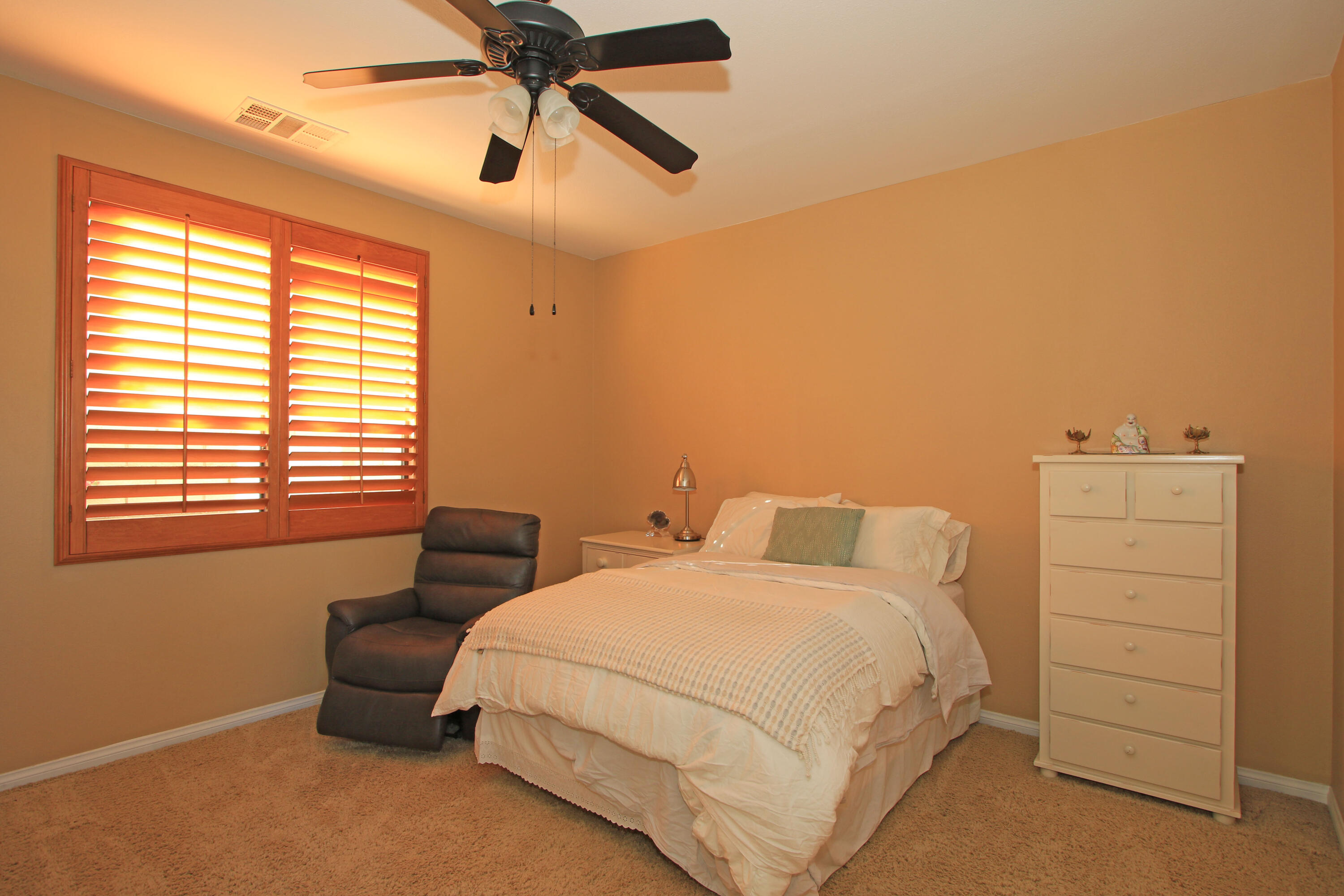 57576 Santa Rosa Trail La Quinta, CA 92253 - Photo 30 of 54 a bedroom with a bed and a window
