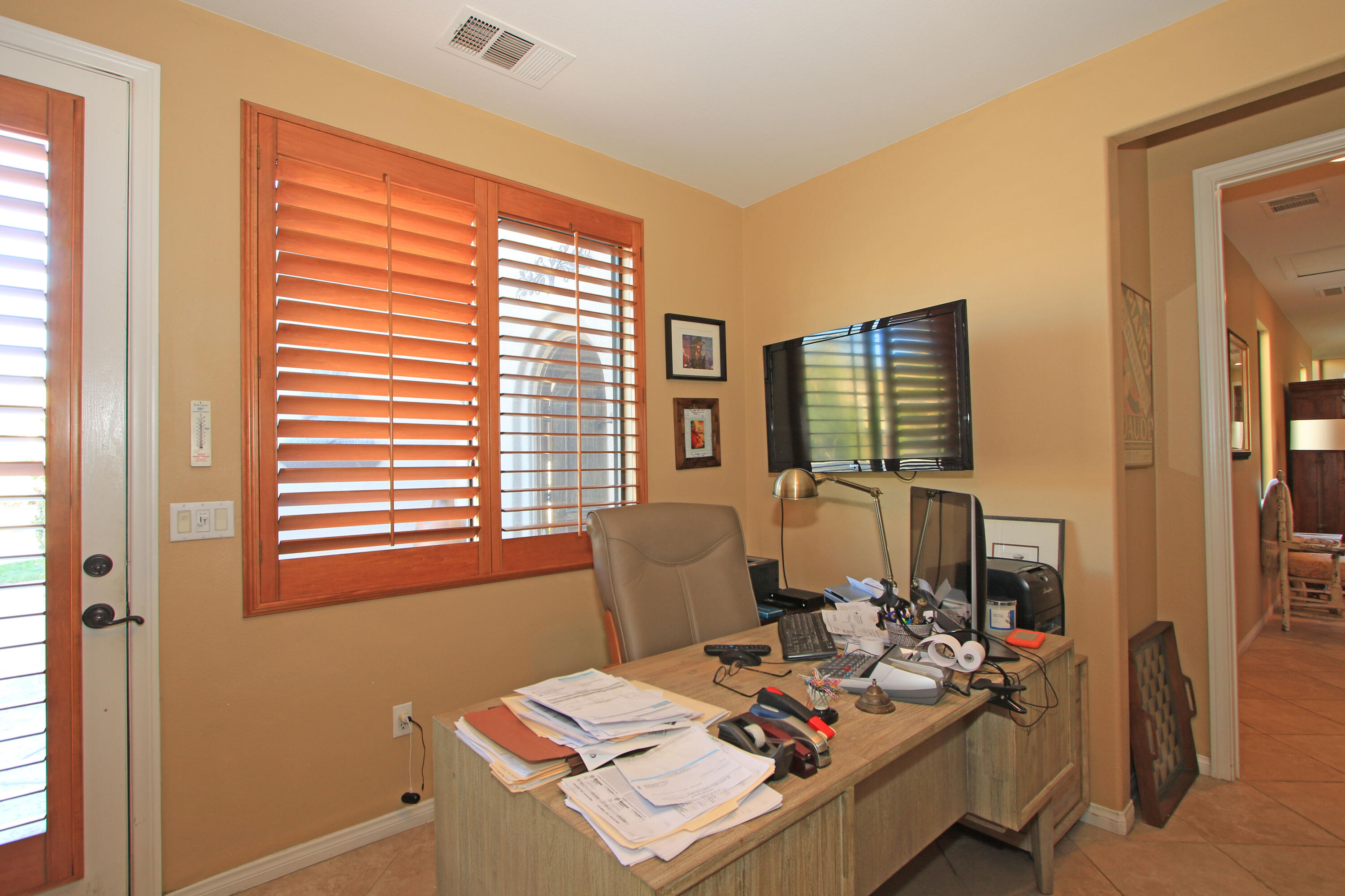 57576 Santa Rosa Trail La Quinta, CA 92253 - Photo 34 of 54 a living room with furniture and a window