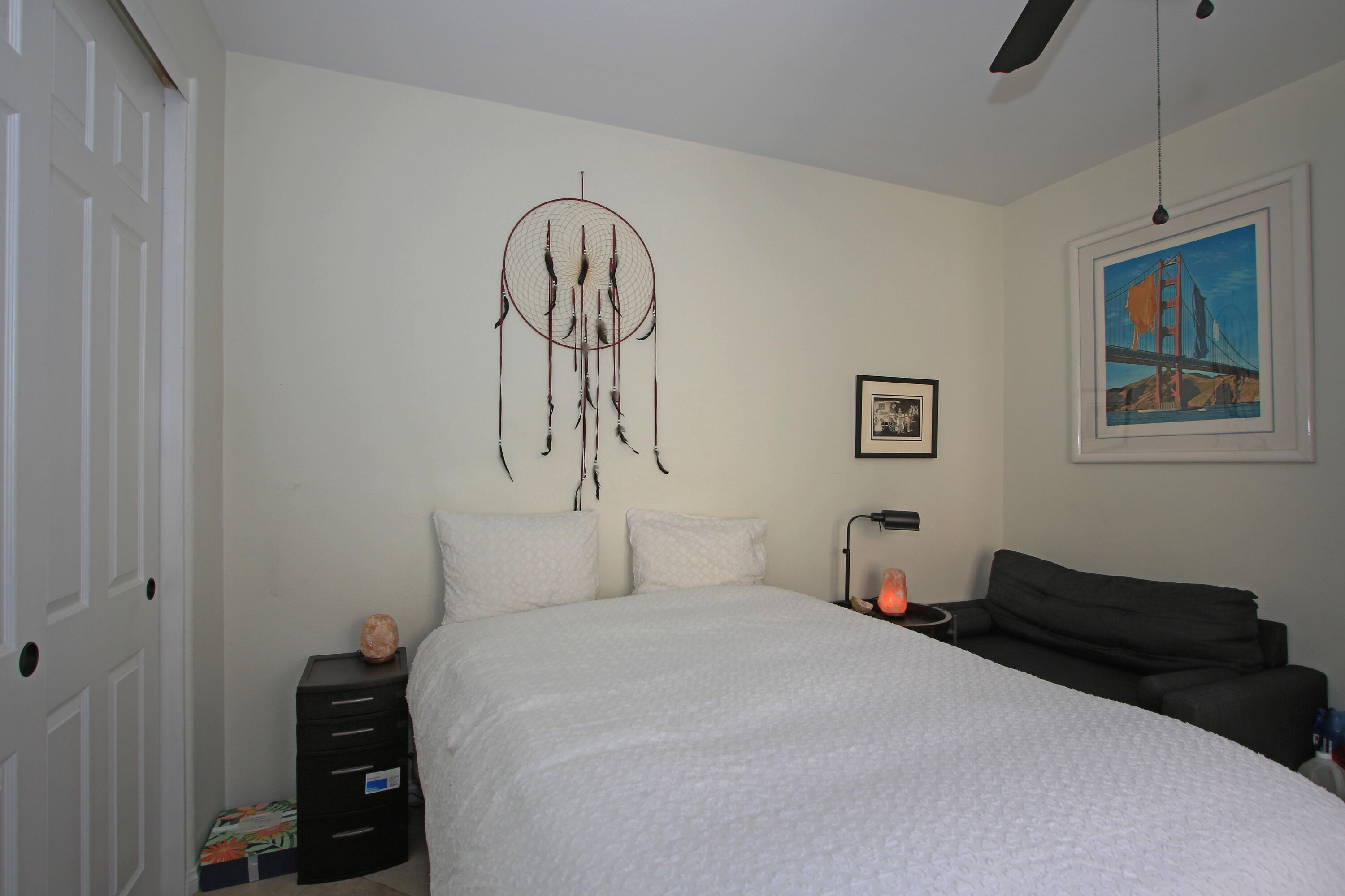 57576 Santa Rosa Trail La Quinta, CA 92253 - Photo 39 of 54 a bedroom with bed and paintings on the wall