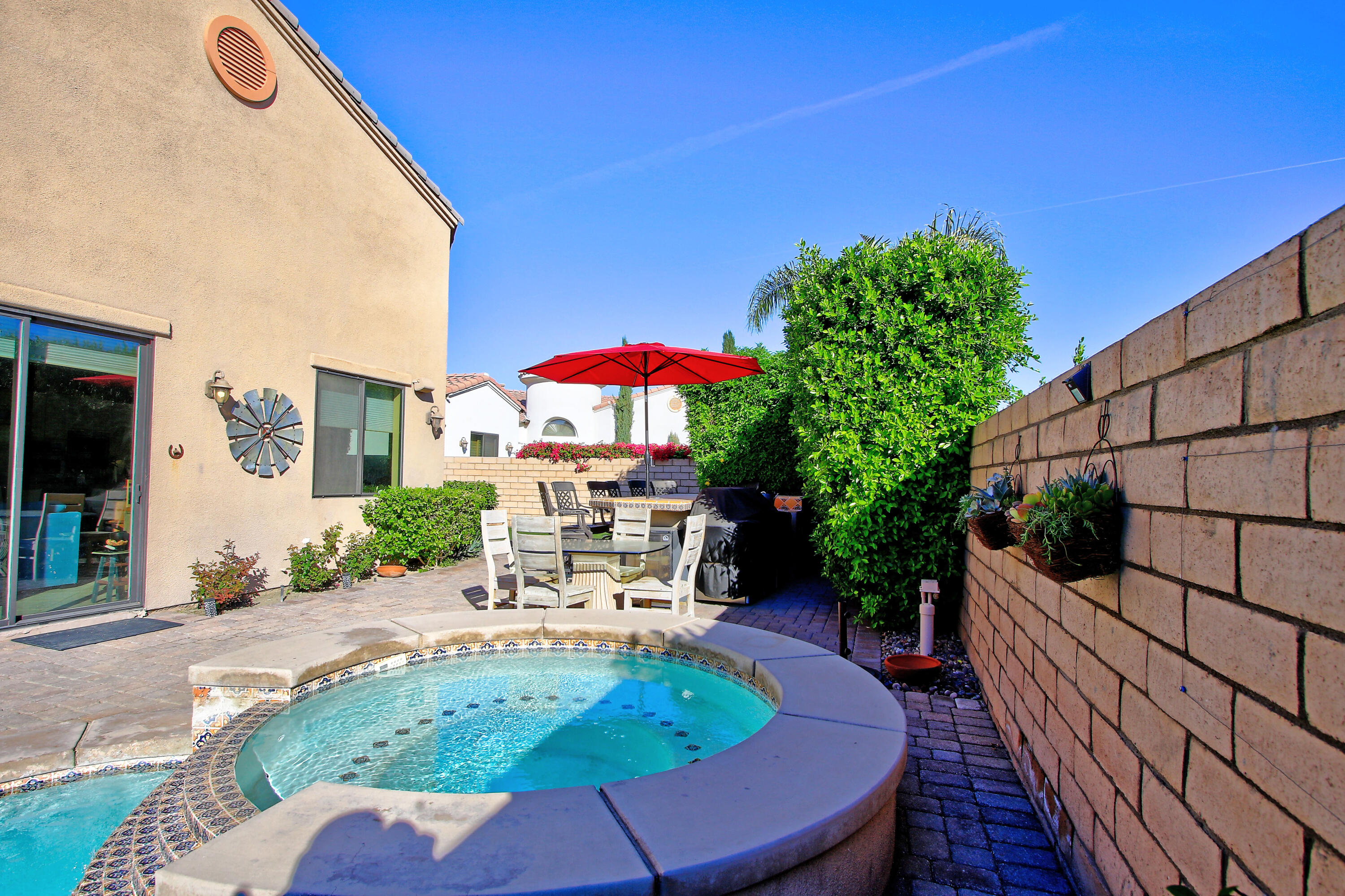 57576 Santa Rosa Trail La Quinta, CA 92253 - Photo 42 of 54 a patio with table and chairs