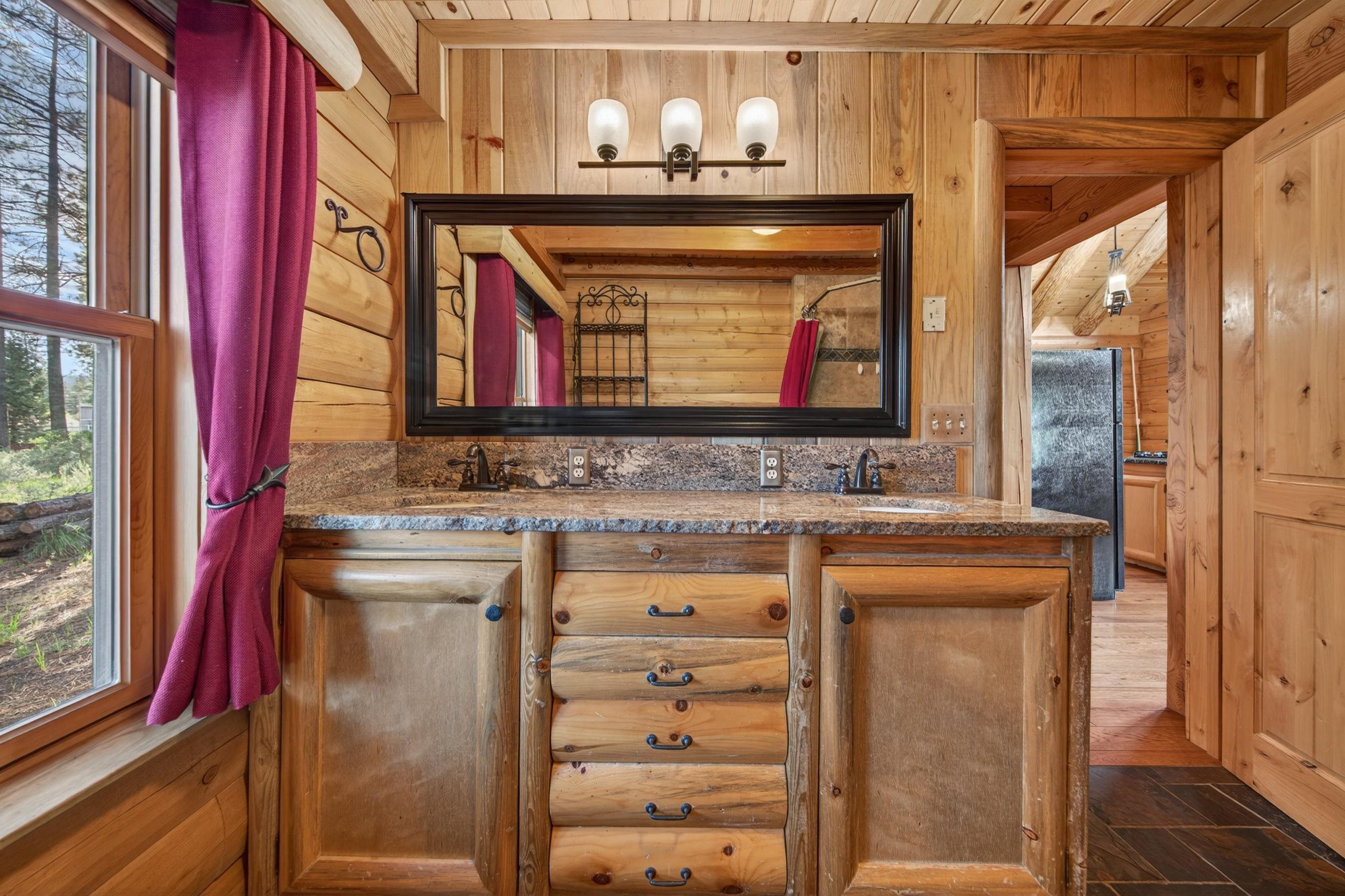 645 Main Street Chester, CA 96020 - Photo 36 of 43 a bathroom with a sink and a mirror
