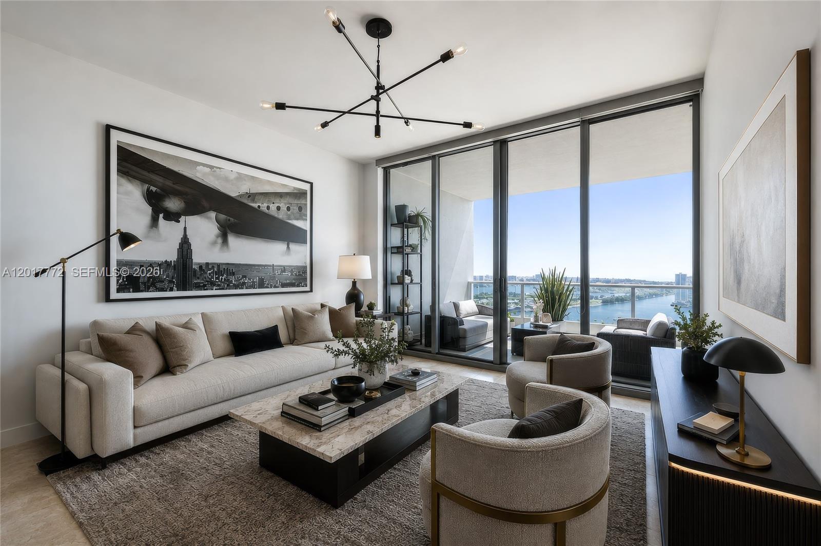 900 Biscayne Boulevard, Unit 4205 Miami, FL 33132 - Photo 2 of 35 a living room with furniture and a large window