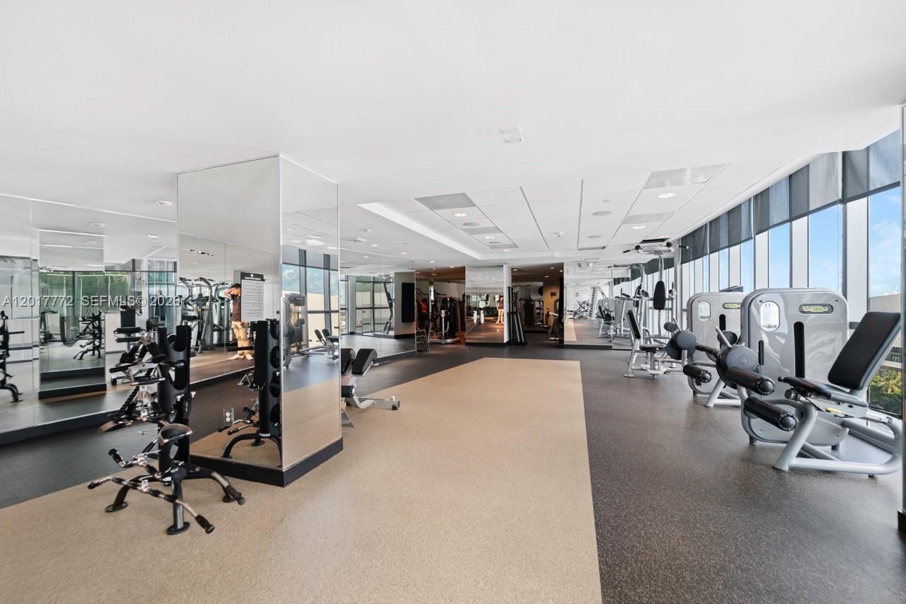 900 Biscayne Boulevard, Unit 4205 Miami, FL 33132 - Photo 24 of 35 a view of a room with gym equipment