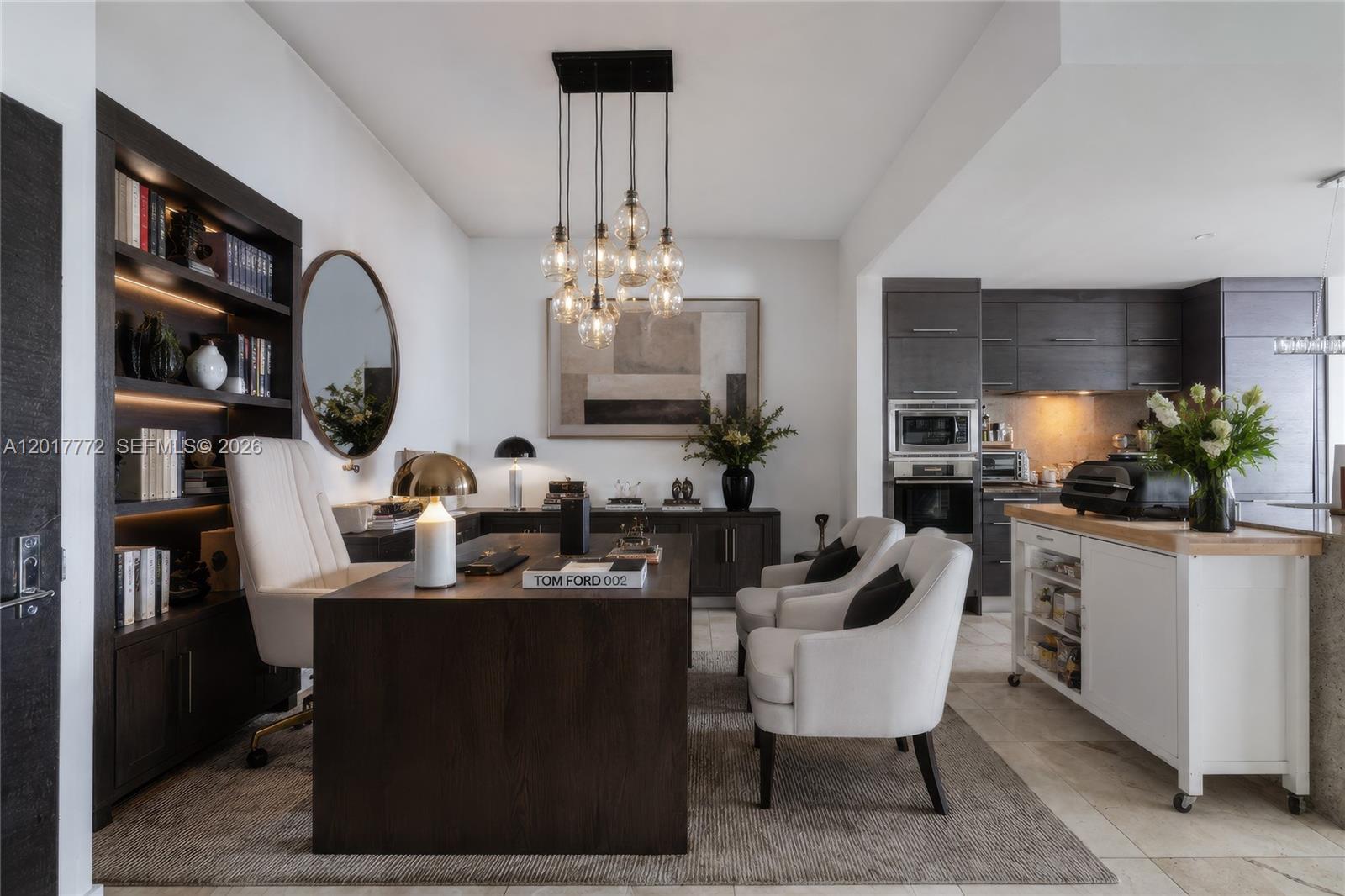 900 Biscayne Boulevard, Unit 4205 Miami, FL 33132 - Photo 4 of 35 a dining room with furniture and a chandelier