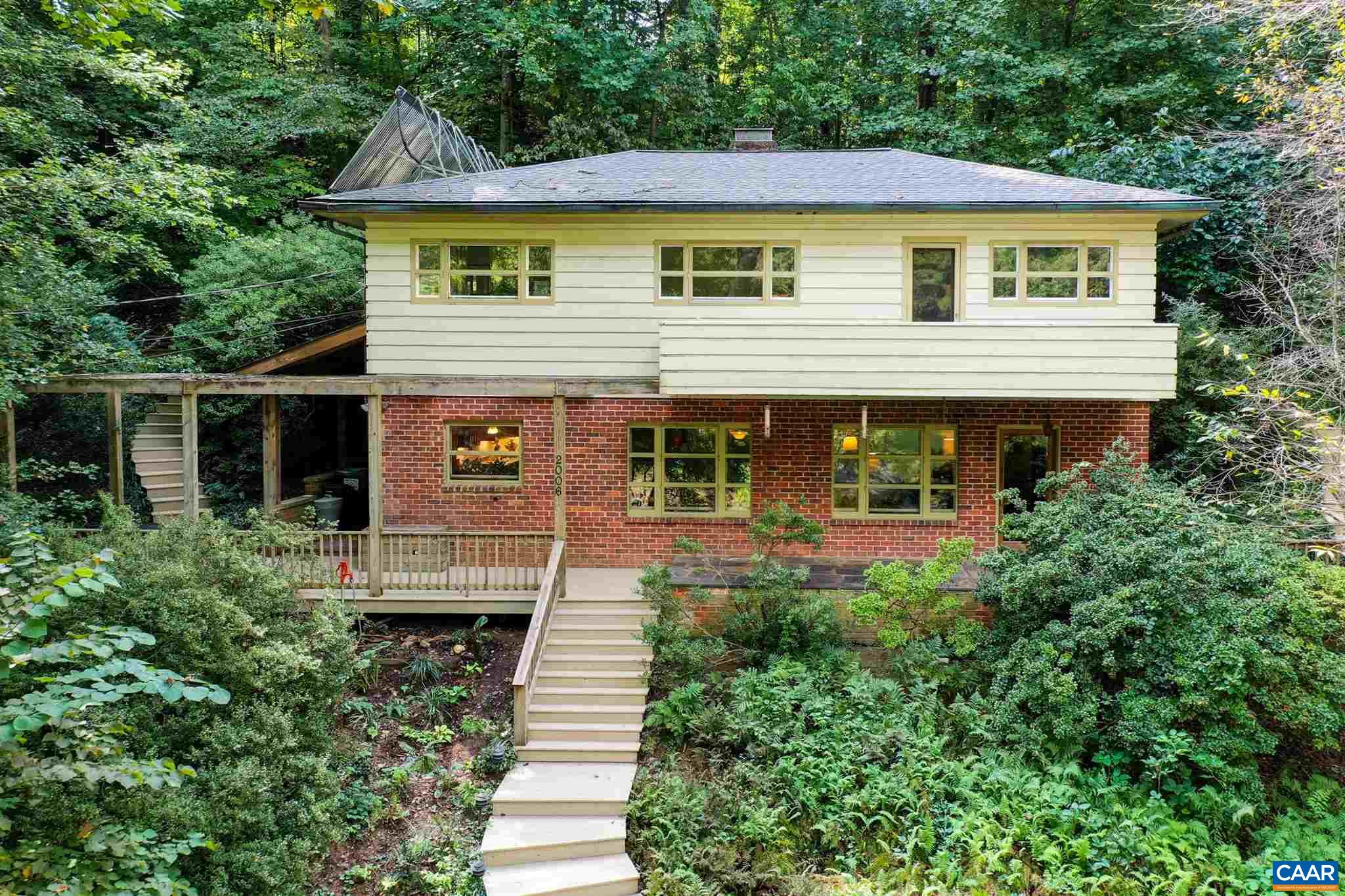 2006 Meadowbrook Road Charlottesville, VA 22903 - Photo 1 of 43 front view of a house with a yard