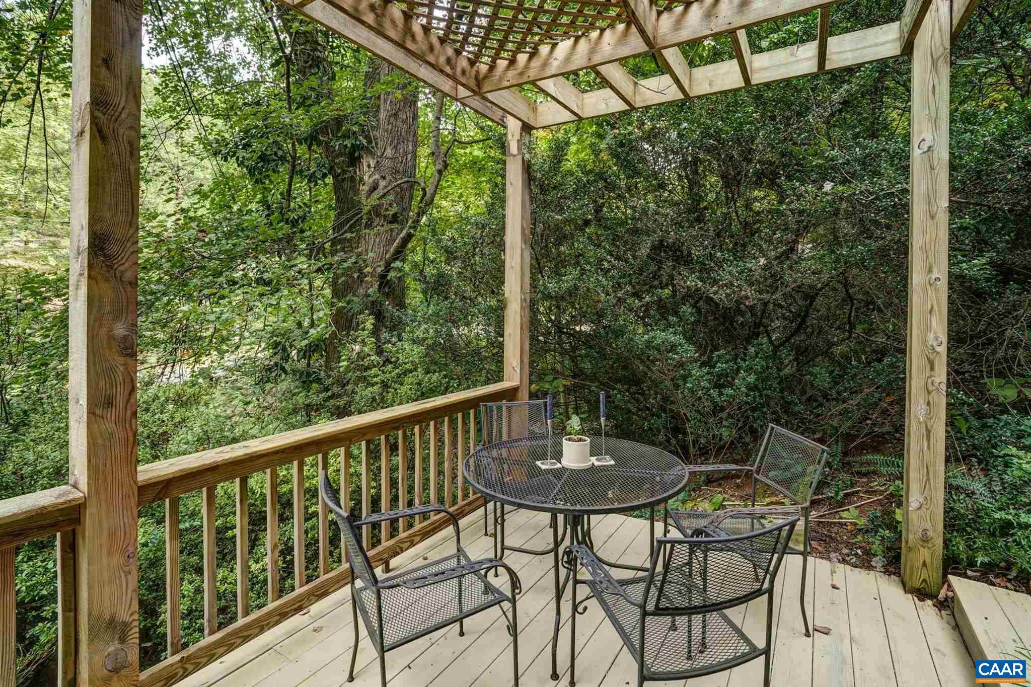 2006 Meadowbrook Road Charlottesville, VA 22903 - Photo 4 of 43 a view of a chairs and table in the balcony