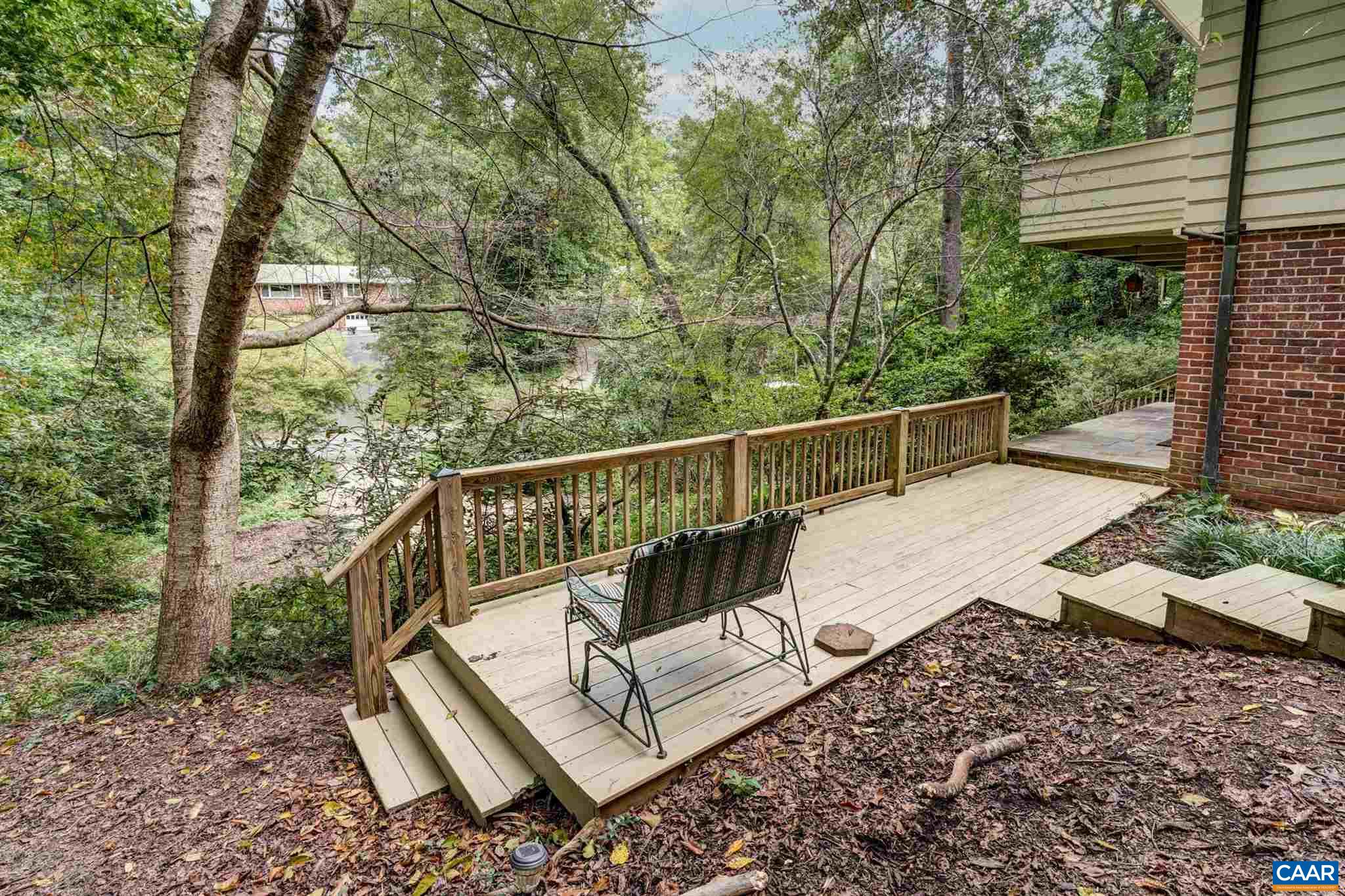 2006 Meadowbrook Road Charlottesville, VA 22903 - Photo 5 of 43 a view of a roof deck with wooden floor and fence
