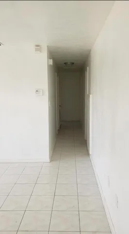 an entryway of a house and an entrance door