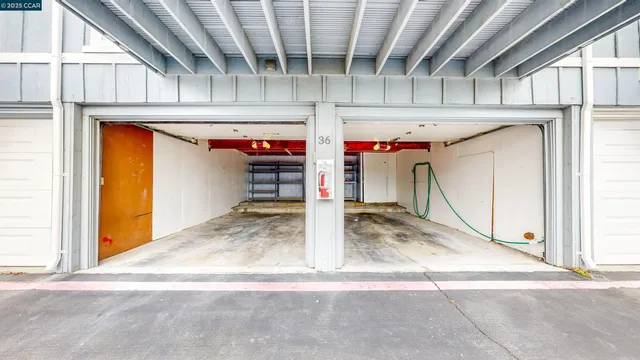 a view of a room with wooden walls