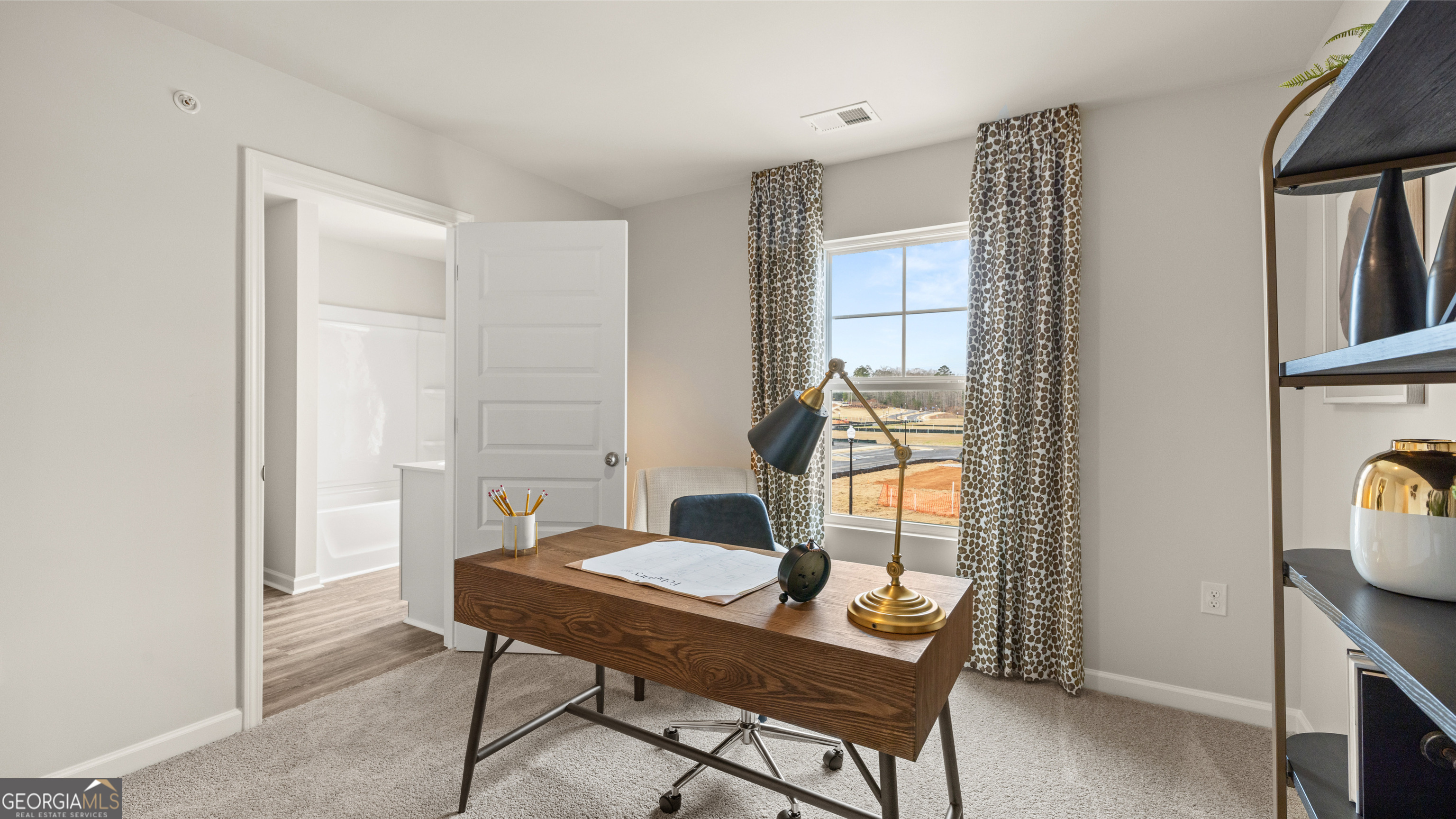 270 Sound Circle Stockbridge, GA 30281 - Photo 28 of 40 a workspace with furniture and a window