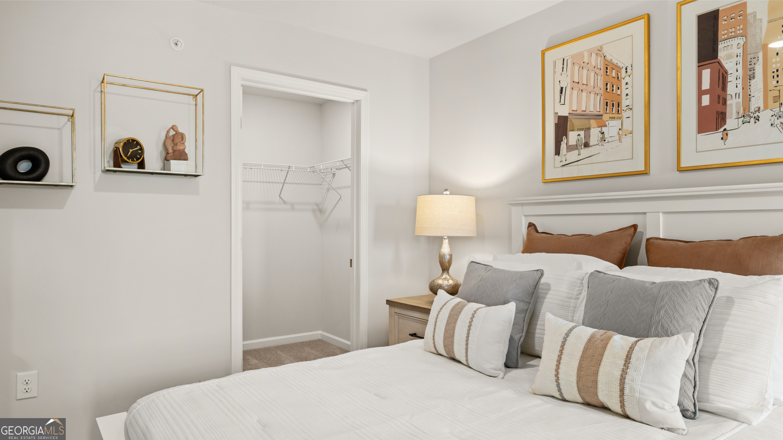 270 Sound Circle Stockbridge, GA 30281 - Photo 30 of 40 a bedroom with a bed and a painting on the wall