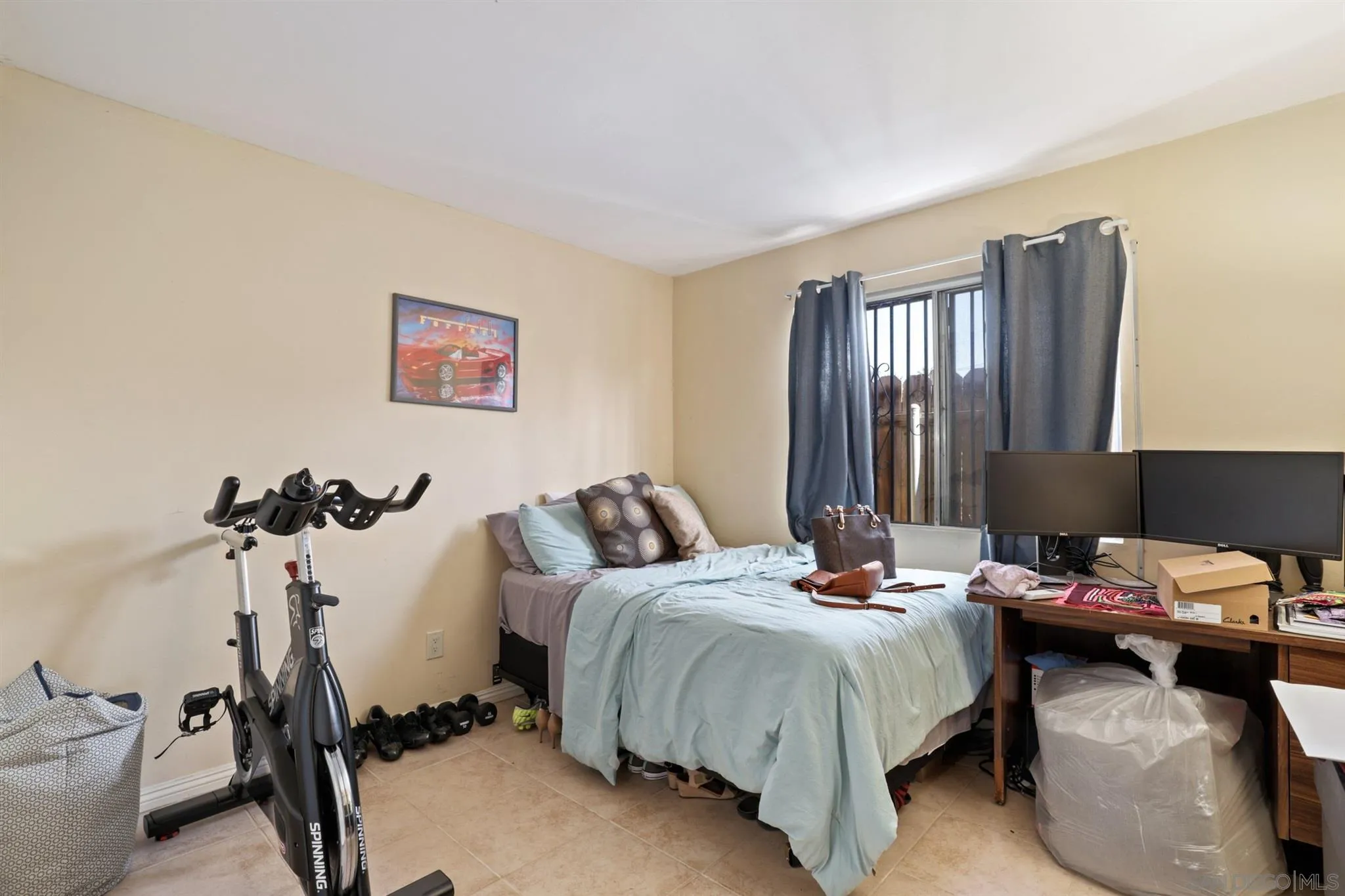 1633 Thomas Avenue San Diego, CA 92109 - Photo 19 of 48 a bedroom with bed and a window