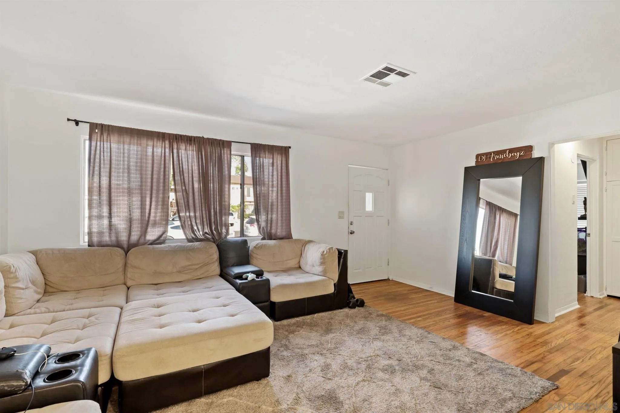 1633 Thomas Avenue San Diego, CA 92109 - Photo 30 of 48 a bedroom with furniture and a window