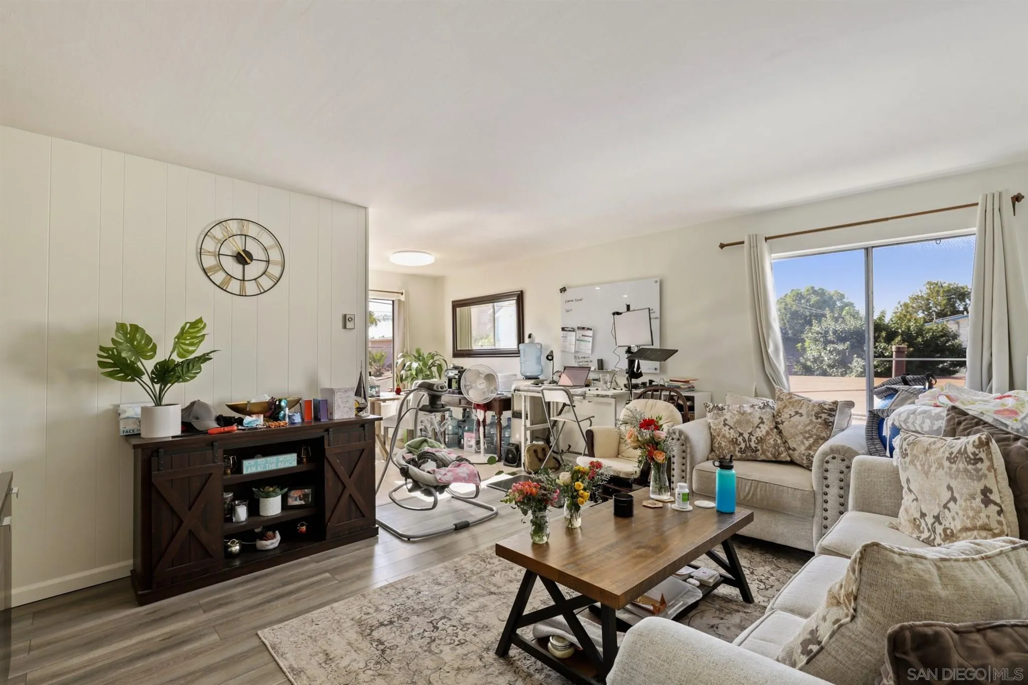 1633 Thomas Avenue San Diego, CA 92109 - Photo 4 of 48 a living room with furniture fireplace and window