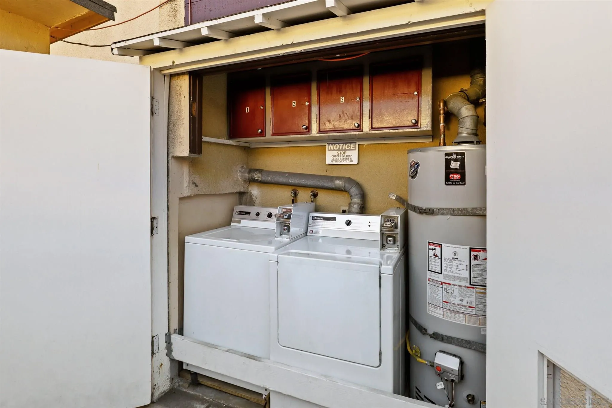 1633 Thomas Avenue San Diego, CA 92109 - Photo 42 of 48 a utility room with dryer and washer