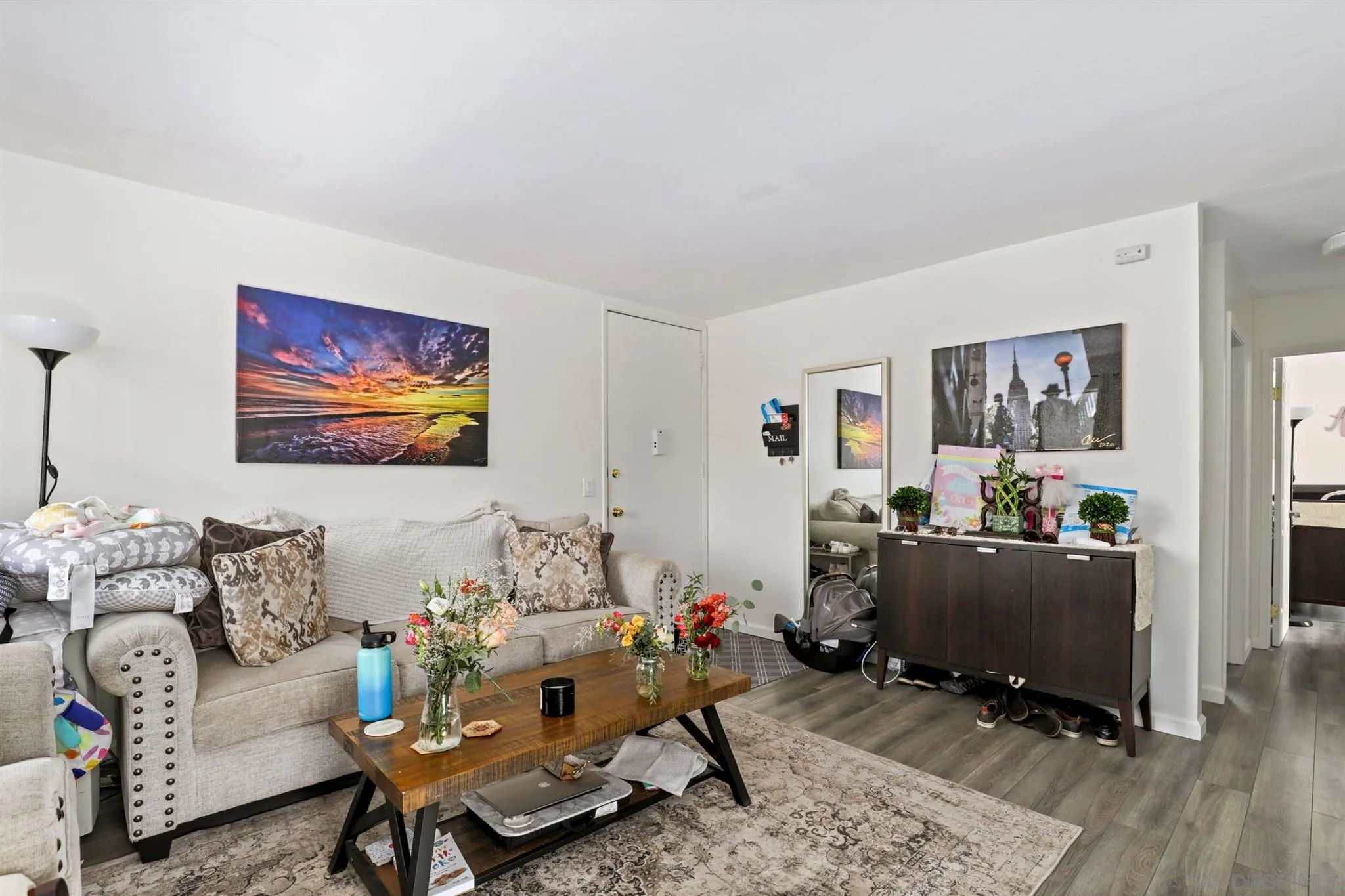 1633 Thomas Avenue San Diego, CA 92109 - Photo 5 of 48 a living room with furniture and wooden floor