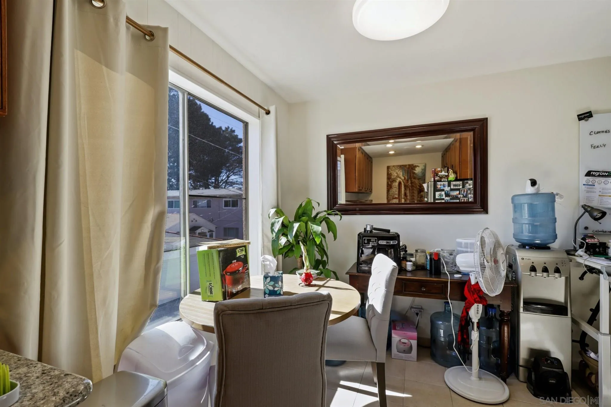 1633 Thomas Avenue San Diego, CA 92109 - Photo 9 of 48 a living room with furniture and a window