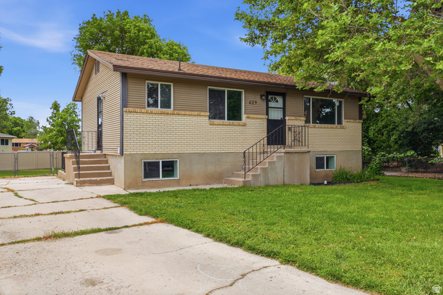 629 King Circle Layton, UT 84041 - Photo 1 of 26 Rambler residence featuring a brick and siding exterior, multiple windows, and a paved driveway