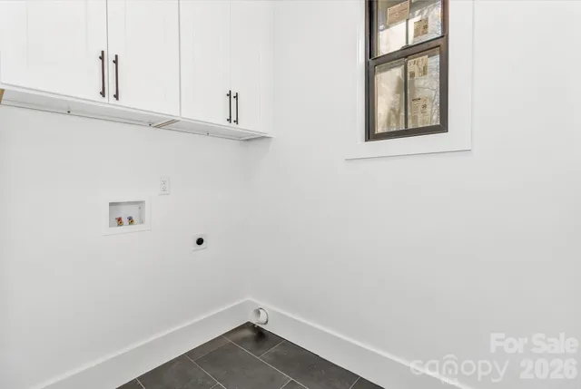 a view of a room that has a window