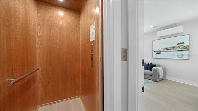 a view of a hallway with front door